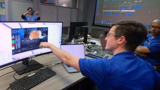 A JPL engineer watching Taters.