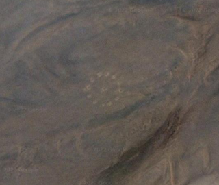 Image from the original Who made these circles in the Sahara? section.
