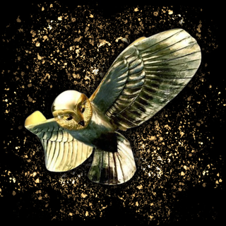 The golden owl sculpture.