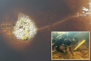 Aerial view of a small artificial island in a Scottish loch.